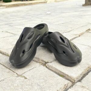 Urban Outfitters Black slip on shoes, sliders, size 9